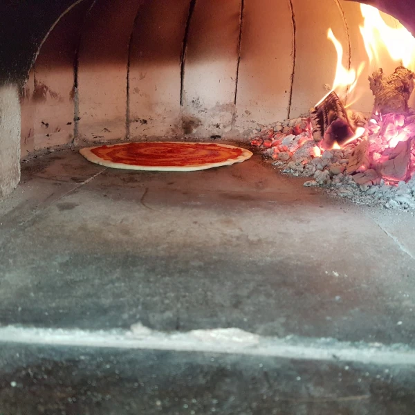 Pizza op een doopfeest