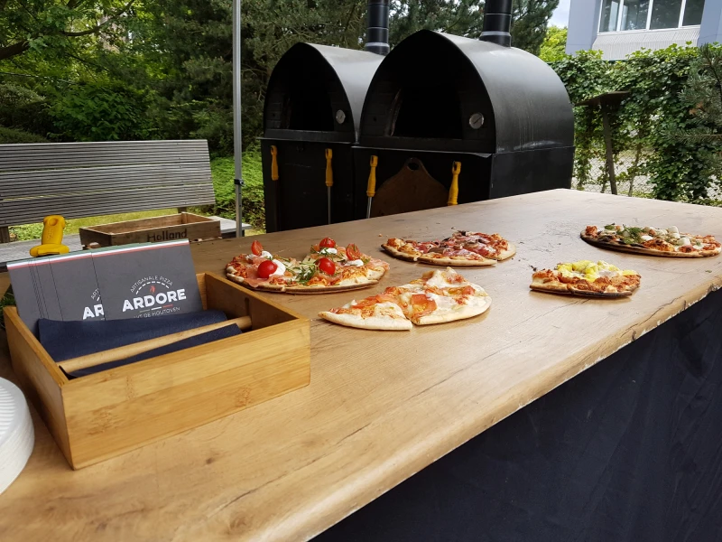 Pizza op een doopfeest